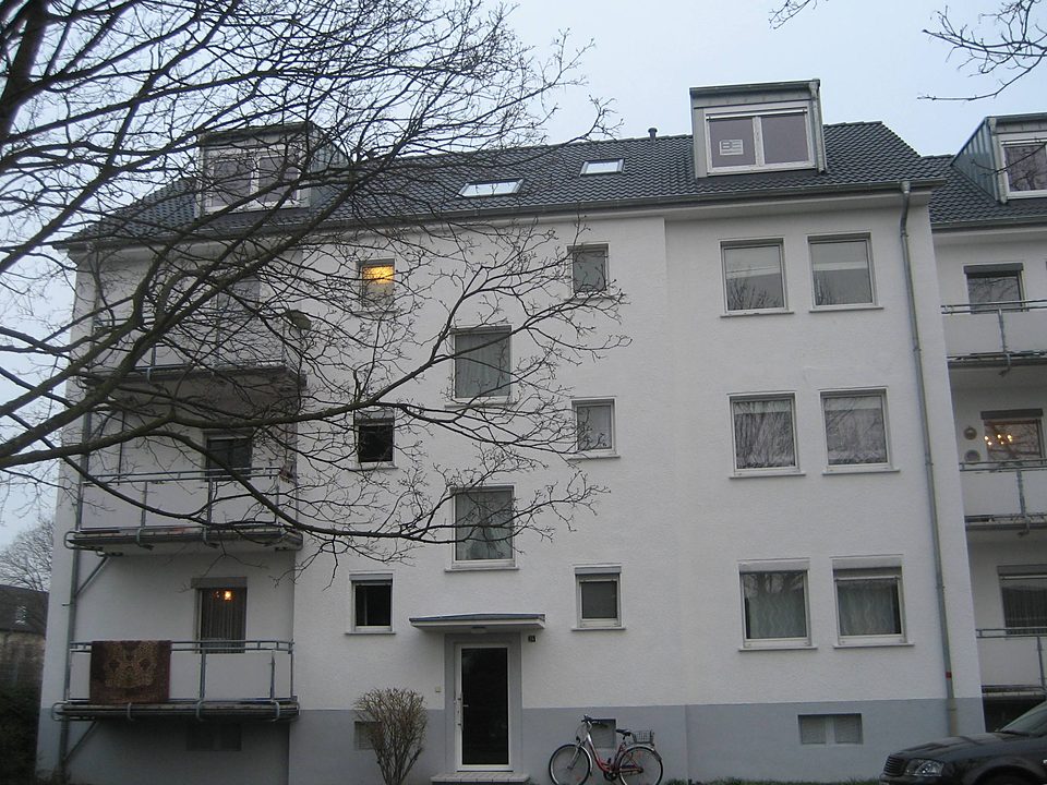 Einfamilienhaus aus rotem Klinker mit Flachdach